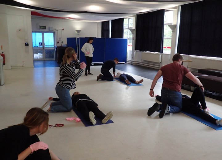 Delegates Learning First Aid